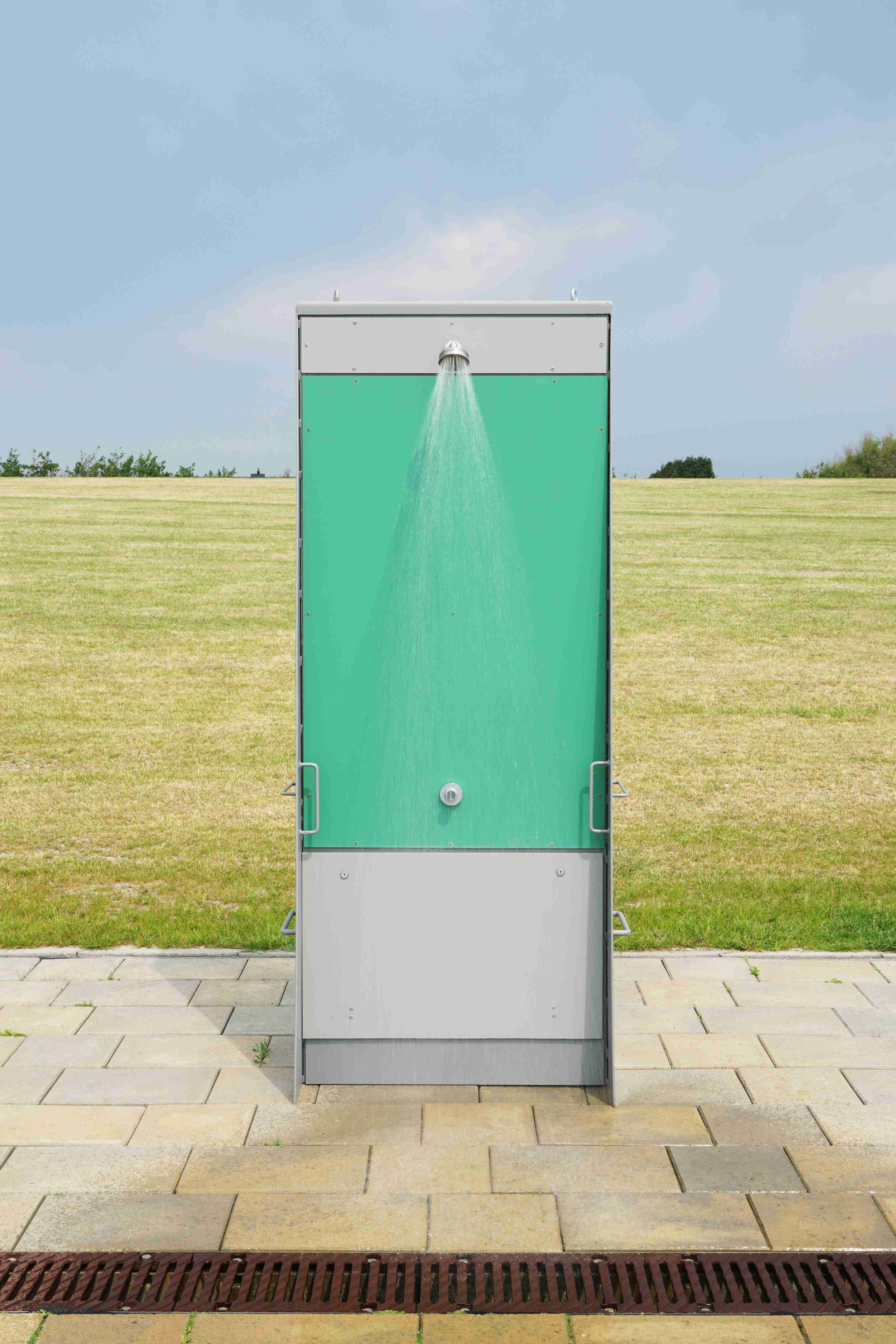 three-trash-containers-full-of-garbage-near-the-dumpster